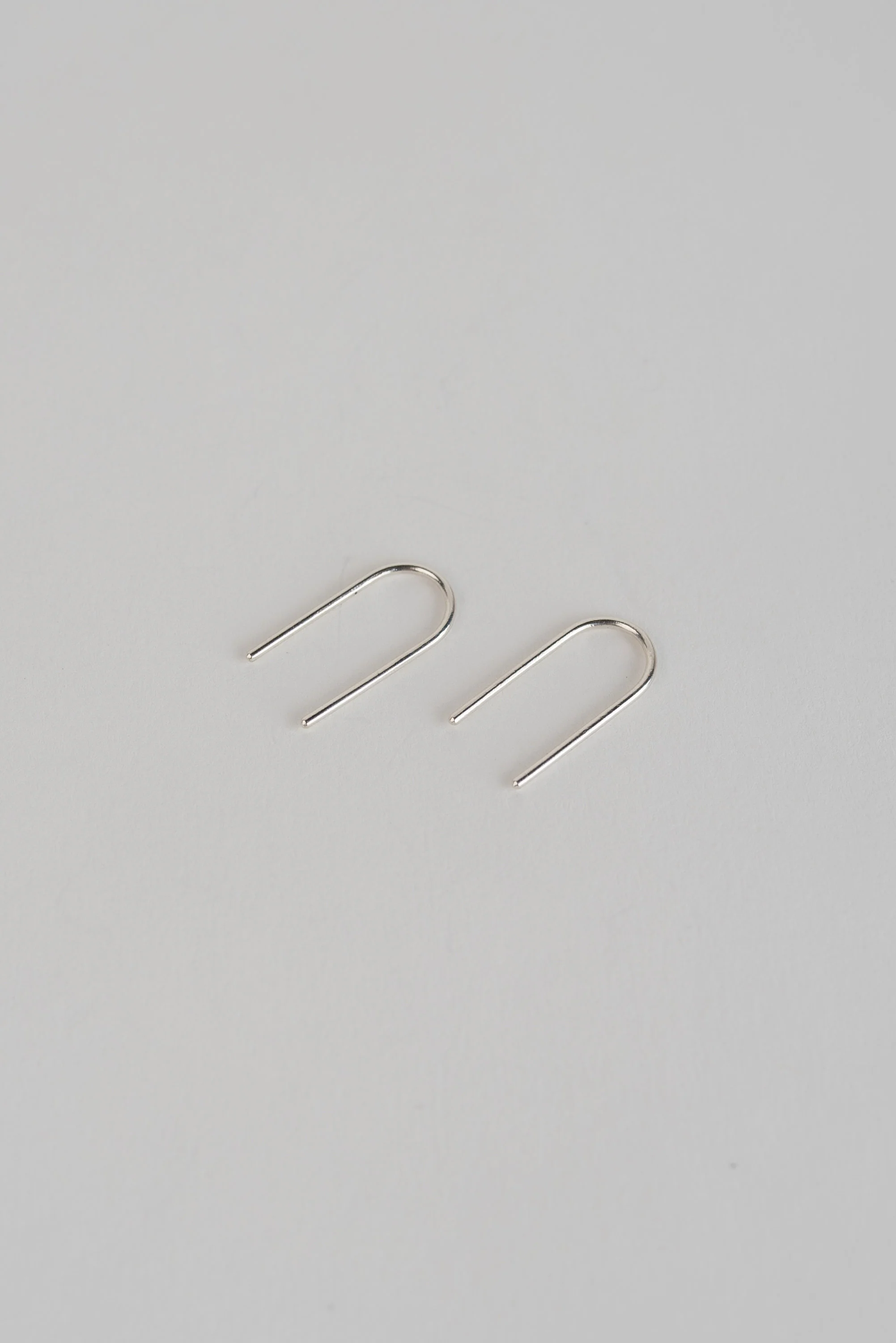Silver Arch Ear Pins - Image 3